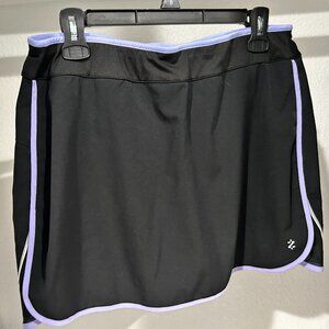 Black Izod Skort with purple piping, Size M